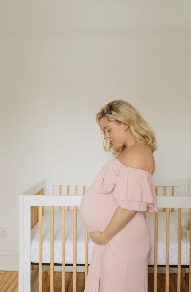 Edie pregnant in nursery_vitamin D impact on pregnancy