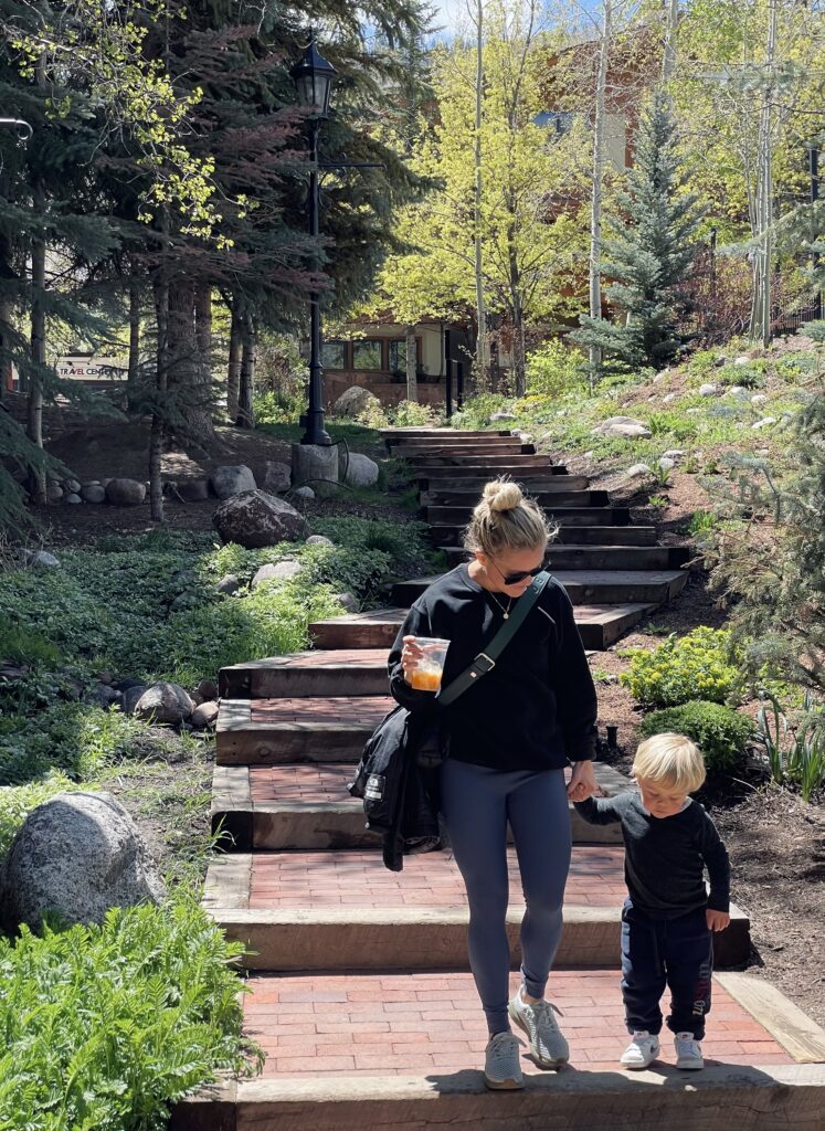 mom and son walking_how to balance hormones in 2023