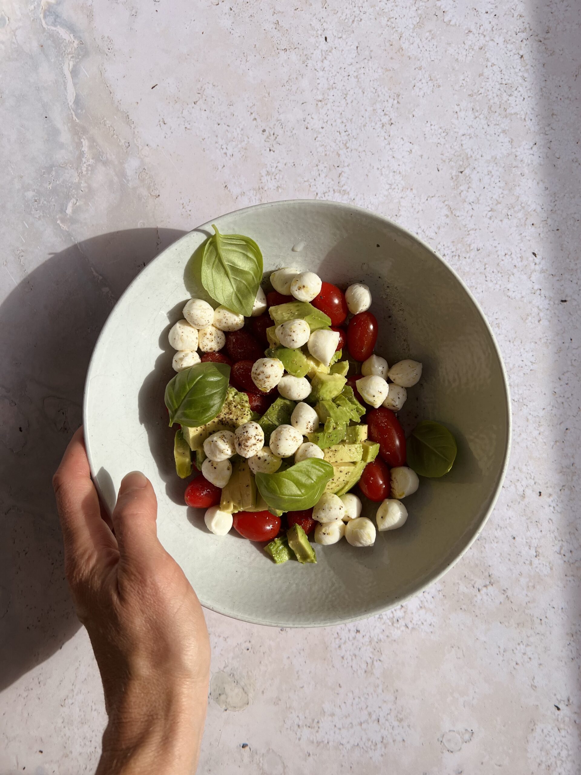 bowl of caprese salad_eating to heal hormones