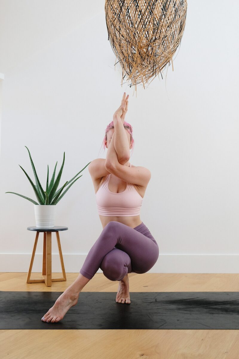 woman doing yoga_hormone balancing superfoods